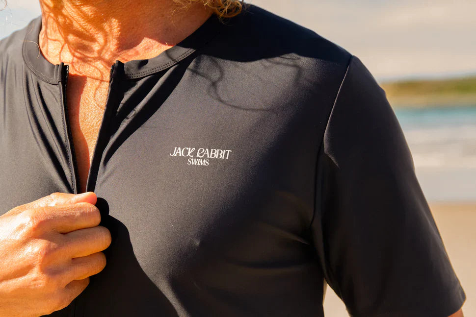 Close-up of Jack Rabbit Swims zip rash guard combining practicality and style